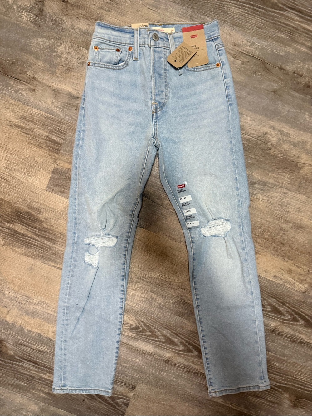 Levi's Light Wash High-Rise Distressed Jeans